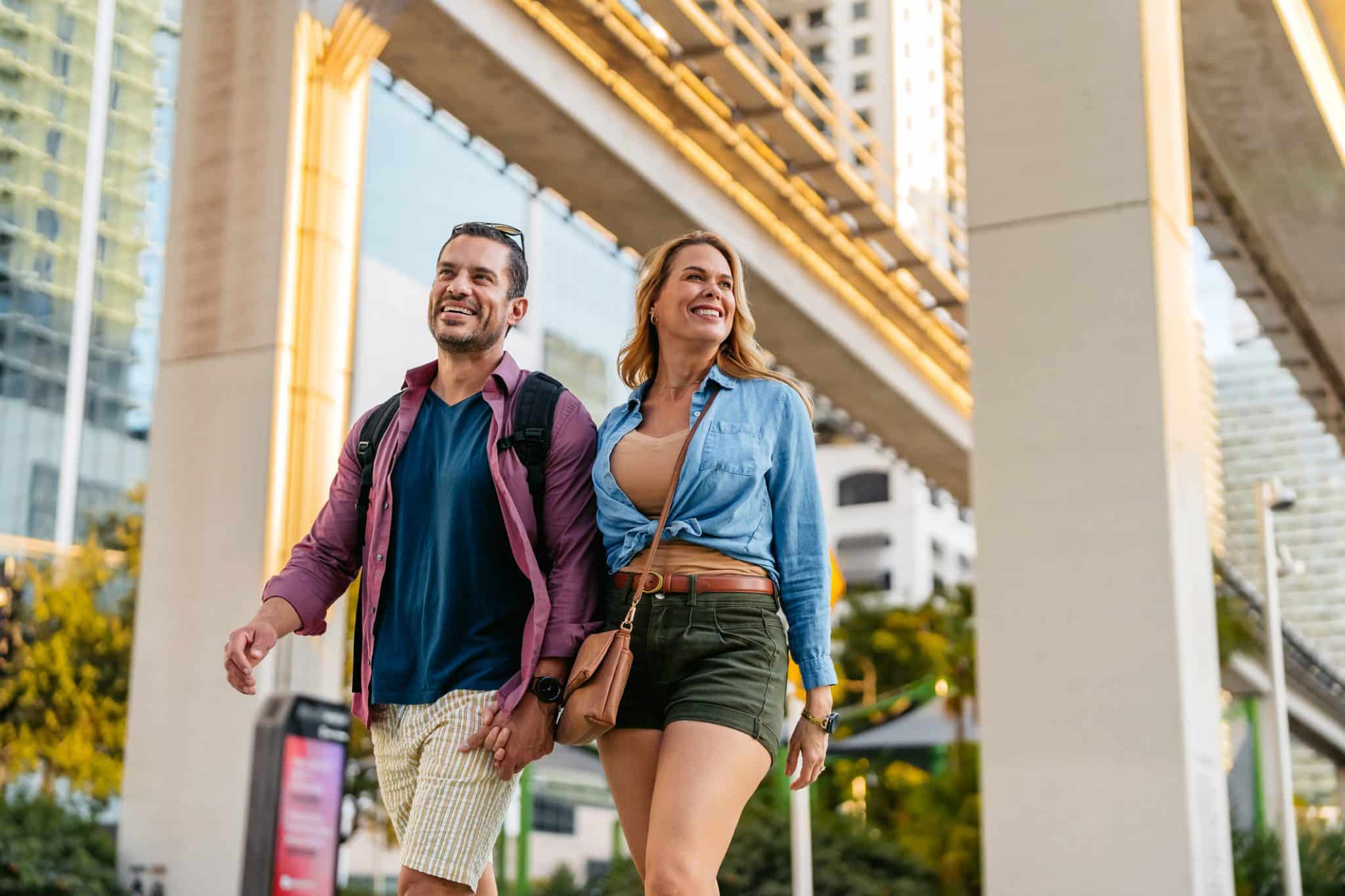 Healthy midlife couple walking outdoors, representing hormone and sexual wellness for women and men
