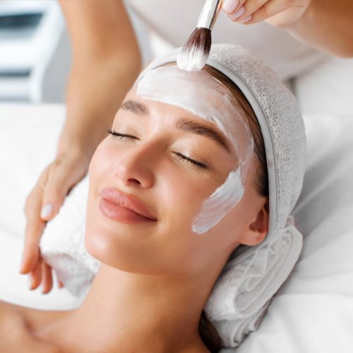 a woman sitting on a bed